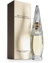 Donna Karan Cashmere Mist. This sheer, floral fragrance combines the essence of Moroccan jasmine, lily of the valley and bergamot with warm undertones of sandalwood, amber and musk. 