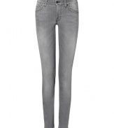 These classic skinny jeans from Seven for All Mankind lend effortless style to any casual ensemble - Five-pocket styling, distinctive logo detail on back pockets - Slim fit, skinny leg - Pair with a tunic top, printed tee, or silk blouse and heels