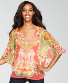 Bright color and a bold print combined with a fluid, flowing drape makes INC's top unique and so much fun to wear! Micro-studding in front adds a touch of shine, too.