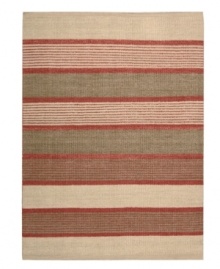 Variegated striping gives way to understated sophistication in the Horizon area rug from Calvin Klein. Generously thick wool fibers are hand tufted in India for remarkable strength and detailed design.