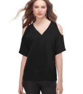 Shoulder cutouts add eye-catching appeal to this Rachel Rachel Roy blouse -- an edgy update to a simple staple!