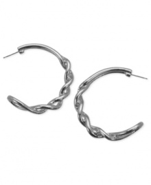 T Tahari puts its own stylish twist on this pair of hoop earrings from the Essentials Collection. Crafted from silver-tone mixed metal. Approximate diameter: 1-1/2 inches.