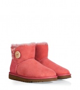 A stylish twist on a venerable classic, the UGG Australia mini Bailey Button boot is a welcome colorful addition to your cold weather casual wardrobe - Crafted from twin-faced sheepskin and featuring exposed seams, reinforced heel, traction outsole, signature UGG label, wooden button and elastic band closure, fleece-lined for superior warmth and comfort - Newer, ankle-height - Truly versatile, perfect for pairing with everything from skinny jeans to yoga pants to mini-skirts