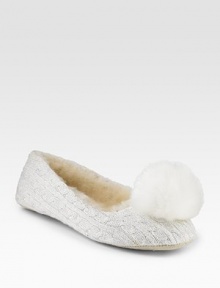 Pristine cabled cotton is adorned with glitter and a soft, pompom at the toe.Round toe Suede sole Imported