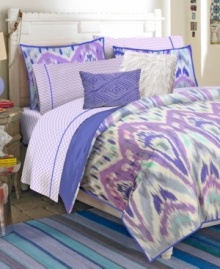 In a fantastic color palette, the Ikat dyeing technique is the focal point of this comforter set from Teen Vogue. Coordinate with the sheet set and decorative pillows for a whimsical allure. Reverses to solid purple.