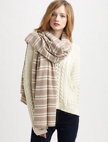 This over-sized, striped scarf is ultra-luxe in cozy cashmere.CashmereAbout 81 X 36Dry clean or hand washImported