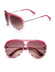 Give glamour a fun, vintage vibe with theses striped acetate frames. Available in fuchsia with lilac mirror gradient lens. Logo temples100% UV protectionMade in Italy 