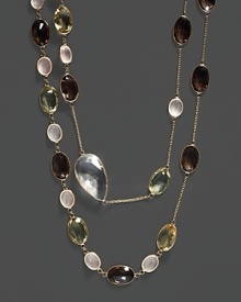 A mix of colorful quartz and clear crystal stations on a 14K yellow gold chain.