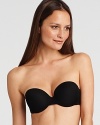 Pushup padded strapless bra can be worn many ways with attachable straps. Hook and eye closure.