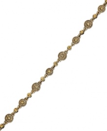 Alluring topaz color lends style to this Charter Club bracelet. The linked design highlights glass stones and medallions. Crafted in 14k gold-plated mixed metal. Approximate length: 7-1/2 inches.