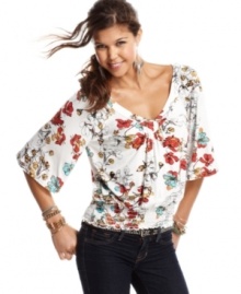 From the floral print to the wide sleeve construction, kimono inspiration abounds on this top from American Rag!