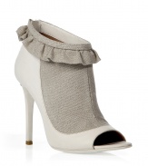 These quirky-chic booties channel antique elegance with a decidedly modern aesthetic - Linen front detail, leather-detailed peep toe and back, ruffle at ankle, stiletto heel - Wear with a flirty cocktail frock, fishnets, and a fur-trimmed jacket