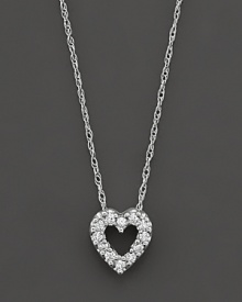 A beautiful diamond heart pendant in 14 Kt. white gold, with rope chain.