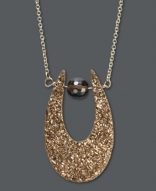 Unique, exotic, and glamorous. A truly original design, this horseshoe-shaped pendant simply glows in warm bronze druzy and 14k gold. Approximate length: 18 inches. Approximate drop: 1-1/4 inches x 3/4 inch.