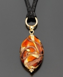 Intricately crafted in Murano glass, this beautiful pendant inspires thought and awe. Pendant hangs from a smooth black cord.  Approximate drop: 1-3/4 inches. Approximate length: 34 inches.