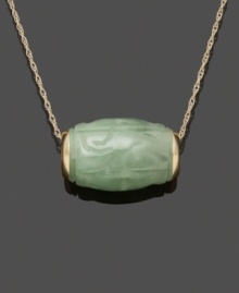 Add uniqueness to your look in this carefully-crafted pendant. Carved from solid jade (10 mm x 15 mm) in pale green hues, this barrel-shaped pendant hangs from a 14k gold setting and chain. Approximate length: 18 inches. Approximate drop: 1/2 inch.