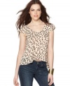 Feminine and altogether sultry, BCBGeneration lightens up a classic animal print top!