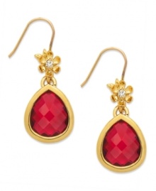 A bouquet beauty. These teardrop earrings from Juicy Couture captivate with floral accents embellished with clear glass stones, sitting atop a faceted ruby-hued glass teardrop. Crafted in 14k gold-plated mixed metal. Approximate drop: 1-1/4 inches.