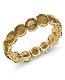 Stone stunner. This glamorous golden bracelet from Charter Club is the epitome of elegance. Set in 14k gold-plated mixed metal, the warm, topaz-hued plastic beads capture and reflect the light in a soft, sunny shimmer. Bracelet stretches to fit wrist. Approximate diameter: 2-1/4 inches.