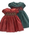 A classic pattern makes this dress a holiday favorite for your baby girl.