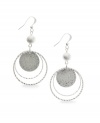 Let perfect rings frame your face. These shimmery orbital drop earrings by Style&co. feature a unique sandblasted design and beaded accents. Crafted in silver tone mixed metal. Approximate drop: 2-1/2 inches.