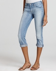 A cropped and rolled silhouette makes these 7 For All Mankind skinny jeans the perfect pair to show off the sunny season's teetering platforms.