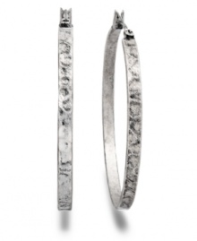 Hammer out the details later...just be sure to accessorize in style first. Lucky Brand's silver tone hoops are hammered to add a slightly rugged edge. Crafted in mixed metal. Approximate diameter: 1-1/2 inches.