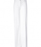 Stylish pants in white cotton - absolute trendy cut in  70s jet-set look - for women whose fashion models are Jerry Hall, Jackie O and Faye Dunaway - looks ladylike, elegant and grown-up - with wide, creased legs, a high waistband with belt loops, button fastener, front pockets - in  summery  white, which is now combined with white for a complete tone-on-tone look - with high wedge heels