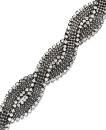 Add elements of sparkle to illuminate your look. Alfani features a chic, braided bracelet accented by round-cut crystals. Set in hematite tone mixed metal. Approximate length: 7-1/2 inches.