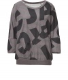 Logo-detailed and ultra-cool, this bold sweatshirt from Marc by Marc Jacobs adds a stylish jolt to your casual look - Round neck, three-quarter sleeves, boxy silhouette, asymmetric seam, allover logo and stripe print, banded hem - Wear with leggings or skinny jeans and embellished ballet flats