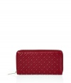 Ultra-chic with an edgy twist, this supple leather wallet from Valentino boasts a stylish sprinkle of studded embellishment - Classic rectangle shape, top zip closure, multiple pockets from credit cards, IDs, and bills, all-over stud detail - Perfect for daily use or as a thoughtful gift