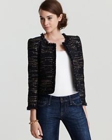 The epitome of chic, this Alice + Olivia jacket in navy and gold tweed is cut in an open silhouette with fringe trim and bracelet-length sleeves. Dress up denim with the Parisian-inspired style or layer over an LBD for a classic finish.