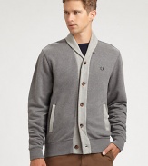 This shawl collar cardigan with contrasting trim exudes effortless cool, shaped in comfortable cotton for long lasting style and comfort.Button-frontShawl collarRibbed knit cuffs and hemSide slash pocketsCottonDry cleanImported