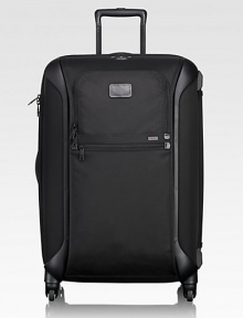 Significantly lighter than traditional wheeled cases, this packing case offers the easy maneuverability of four 360° spinner wheels, all-around bumper guards and smooth, durable ballistic nylon fabric covering a strong, flexible polypropylene shell.Zip closureExterior zip compartmentsInterior zip, mesh compartmentsTop carry handleProtective feetBallistic nylon22W x 16H x 10DImported