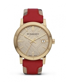 This Burberry watch makes an unforgettable impression. Crafted of gold-plated stainless steel with a bold, checked band, it models distinctive, designer style.