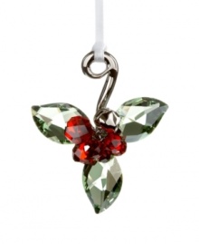 Add a touch of vintage style to you Christmas decorations! This nostalgic design features Peridot Silver Shade crystal leaves and Light Siam Satin crystal berries. The little bell and branch are created in silver-tone metal. Hanging elegantly on a white satin ribbon, it combines perfectly with the Winter Berries in clear crystal