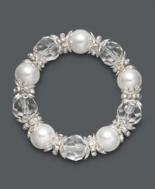 Chill out in sweet style with an icy sheen. Charter Club's chic stretch bracelet features white simulated pearls, clear plastic beads, and silver tone mixed metal accents. Bracelet stretches to fit wrist. Approximate diameter: 2-1/4 inches.