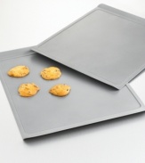 Bake gooey chocolate chip or moist oatmeal raisin cookies with this medium cookie sheet. Features include nonstick interiors and exteriors for easy cleaning, no-hassle food release and optimum baking performance. Reinforced nonstick surface also offers long-lasting durability. Constructed of aluminized steel to resist rusting. Rolled edges are reinforced with tinned steel wire for added strength. Flat edges allow food to slide off from pan to plate without utensils. Oven safe to 450 degrees. Lifetime warranty. Model BW1415.