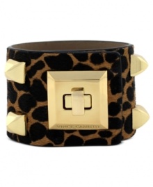 Fast and fierce style from Vince Camuto. This chic cuff bracelet features gold tone stud and turnlock details. Crafted with leopard print leather. Approximate length: 8 inches.