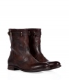 Add a kick of cool to your look with N.d.c.s chocolate leather boots, detailed with an oiled finish for that vintage, broken-in feel - Rounded toe, buckled strap, welt, stacked leather heel, pull-on style - Hits above the ankle - Wear with everything from jeans and pullovers to feminine dresses and leather jackets