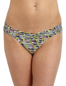 THE LOOKAbstract animal printSide ruched panelsLogo-embossed button at frontElastic waist and leg openingsTHE MATERIAL80% nylon/20% spandexFully linedCARE & ORIGINHand washImportedPlease note: Bikini top sold separately. 