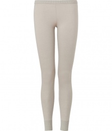 Sumptuously soft and effortlessly cool, Donna Karans pure, beige cashmere blend knit leggings epitomize understated luxury - Crafted with a touch of flattering stretch material - Curve-hugging, medium-rise pull on style with elasticated waist - All-over fine ribbing and cuffed ankles - A must for chic off duty looks - Pair with oversize pullovers, long white button downs and tunic tops