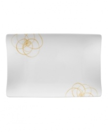 A modern canvas for everyday meals, the large Bloom Sun rectangular plates have a smooth, flat surface that's artfully scribbled with golden florals for a look that's fresh--and in durable porcelain--not fussy. From Villeroy & Boch.