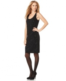 Intricate beading adds a glamorous look to this easy-to-wear jersey dress from Calvin Klein. A perfect piece for seamlessly transitioning from day to night.