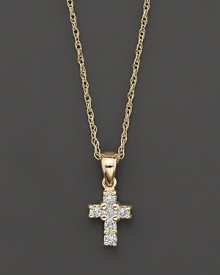 A heavenly diamond cross pendant in 14 Kt. yellow gold, with rope chain.