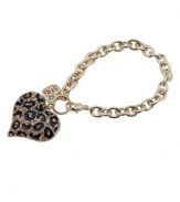 Perfect for prowling. This fierce style from GUESS features a leopard print heart in black enamel and crystal. Setting and cable chain crafted in gold tone mixed metal. Approximate length: 7-1/2 inches.