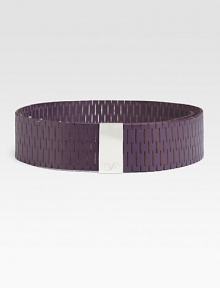 A supple leather design detailed in chic perforations and a logo engraved, metal buckle. Width, about 2¼Imported 