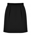 Finish your look on an impossibly feminine note with Tara Jarmons jet black pleated wool skirt, perfect for showcasing breezy tops and statement accessories - Hidden back zip, contrast grosgrain waistline with flat bow detail, full skirt - Style with romantic silk blouses and platform pumps