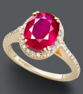 Bold, beautiful, and brilliant. Inspire your look with an oval-cut ruby (3-3/8 ct. t.w.) surrounded by round-cut diamonds (1/3 ct. t.w.). Crafted in 14k gold.