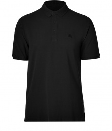 Casual yet sleek, Burberry Brits black cotton polo is cool way to dress up your laid-back looks - Classic collar, short sleeves, partial button-placket, tonal embroidered logo at chest, slit sides - Modern straight cut - Wear with your favorite jeans, a hoodie and sneakers